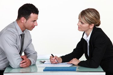 Image of man and woman discussing Image of man and woman discussing
