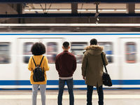Group%20of%20friends%20waiting%20the%20train%20in%20the%20platform
